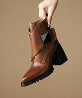 Edle braune Stiefel aus Rindsleder mit dickem Absatz und spitzer Zehenpartie